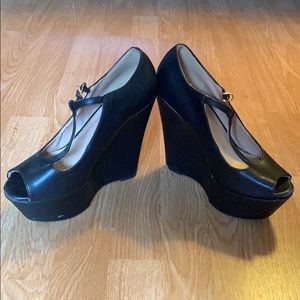 Black high heel wedges size 8